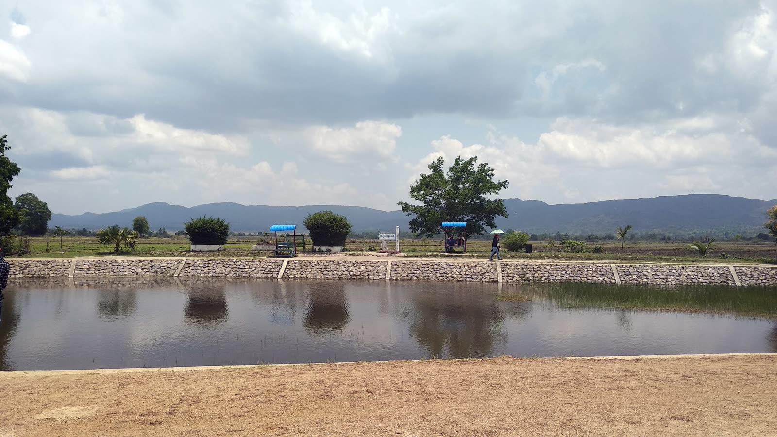 Htee Pwint Lake in Demoso Township, Kayah State, Myanmar — green hills around the water