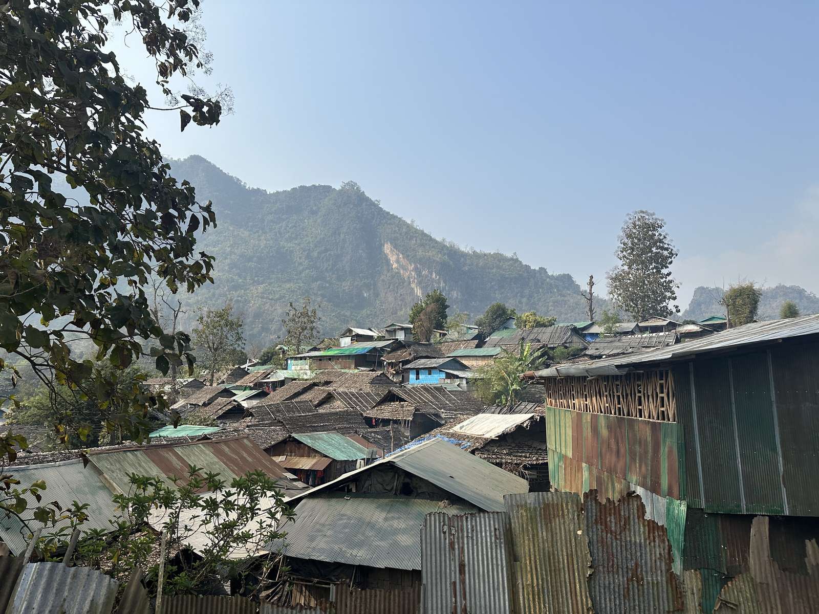 Mae La, Thailand — houses and trees on a green hillside, primarily a Karen refugee community from Myanmar