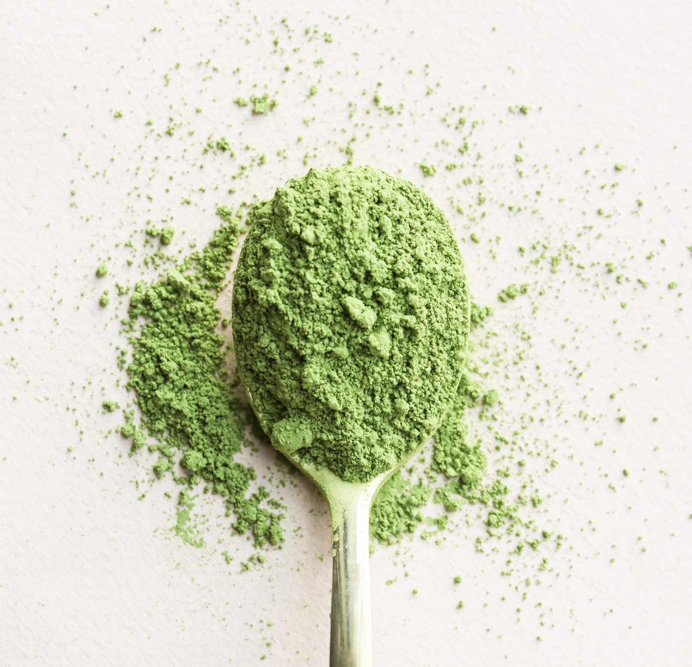 A scoop of green powder